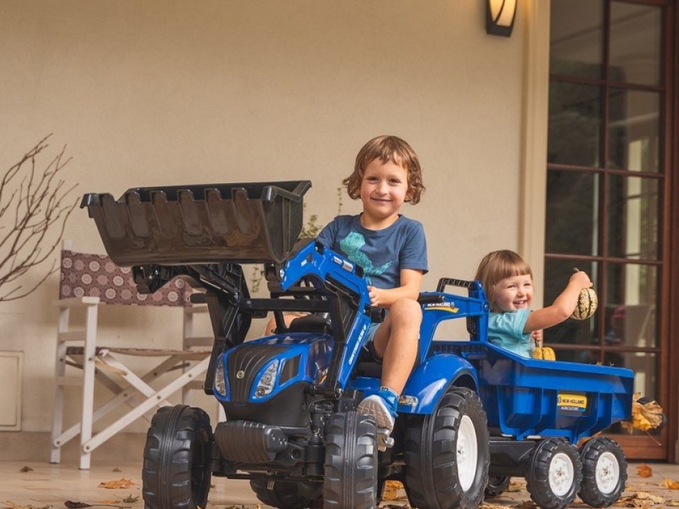 Children on a ride-on tractor
