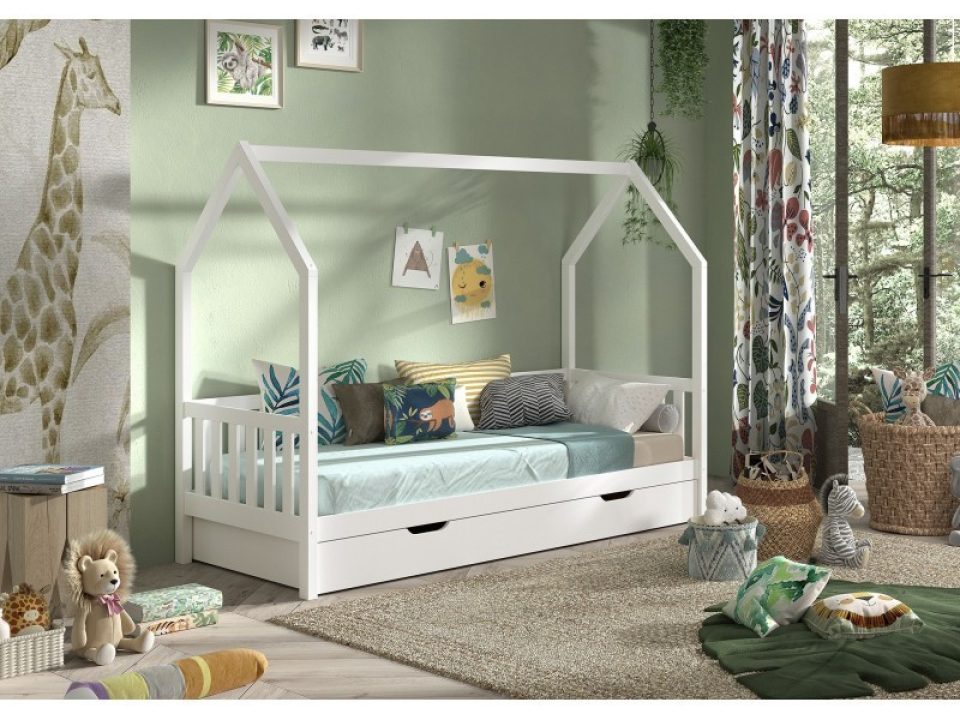 Children's room with a white house bed